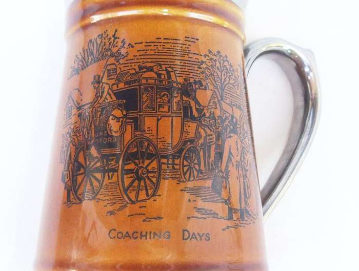 A vintage jug with Coaching Days theme made by Lord Nelson pottery England