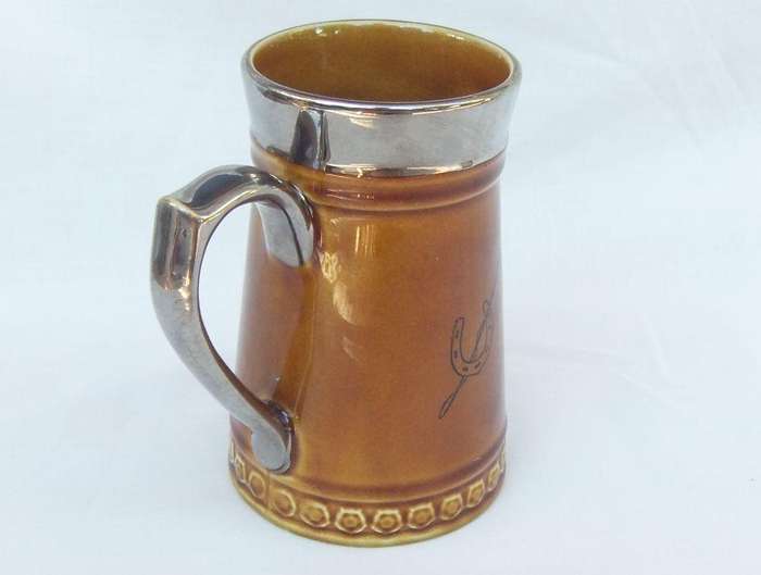 A vintage jug with Coaching Days theme made by Lord Nelson pottery England