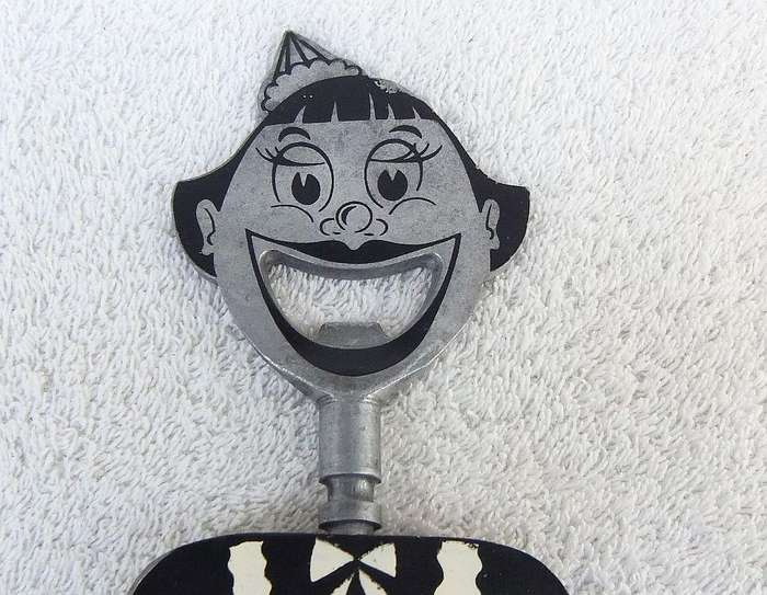 A vintage 1950`s Barmaid corkscrew with bottle opener