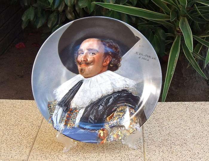 A vintage German made porcelain display plate by Kaiser depicting an image of Frans Hals