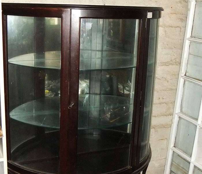 A rare vintage Rhodesian Teak half moon display cabinet made in Salisbury Rhodesia