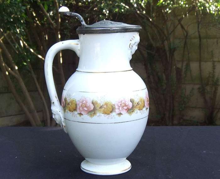 A rare antique mid 1800`s tankard with hinged pewter lid