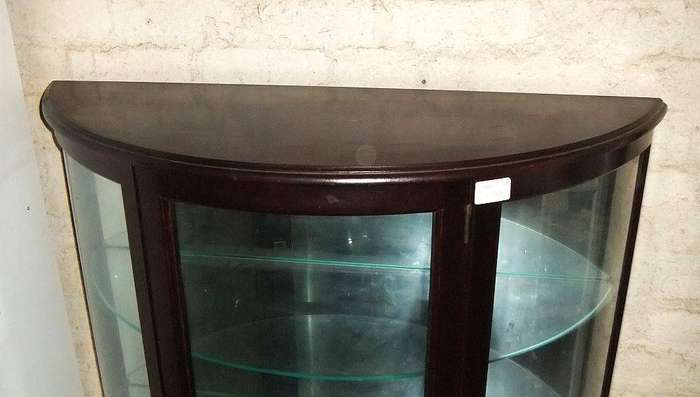 A rare vintage Rhodesian Teak half moon display cabinet made in Salisbury Rhodesia