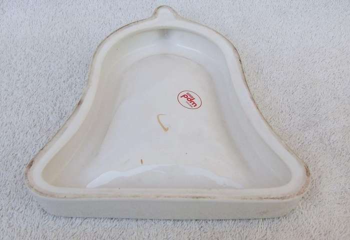 A vintage Bells whisky advertising bar ashtray made by Wade England