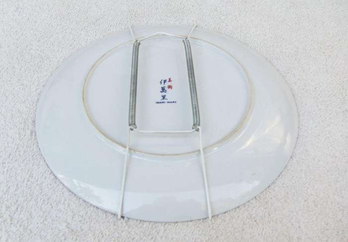A large vintage genuine Japanese Imari porcelain charger / wall plate