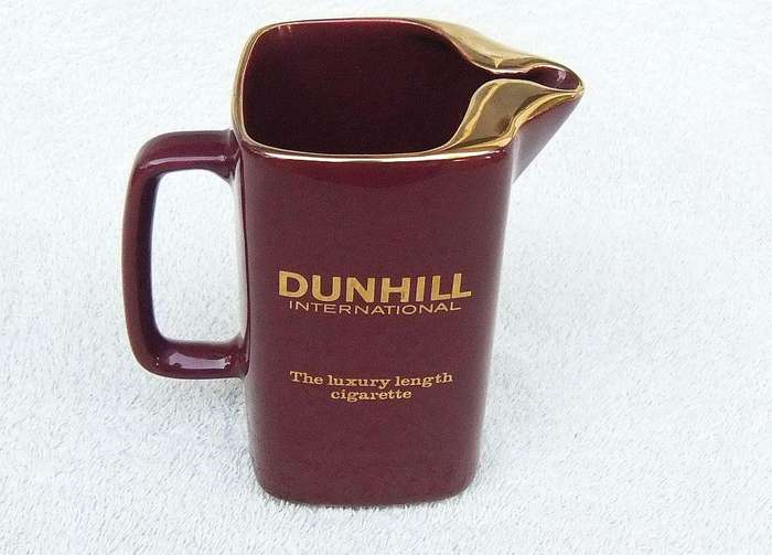 A vintage Dunhill advertising water jug by Wade England