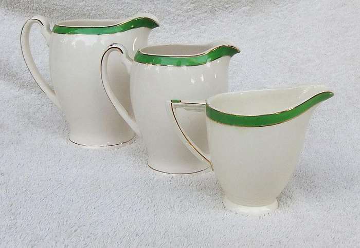 Three Art Deco period porcelain jugs by Alfred Meakin England
