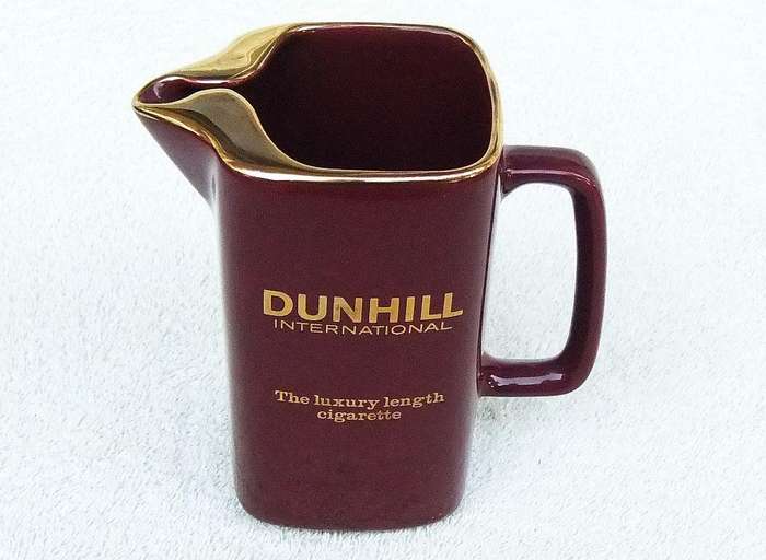 A vintage Dunhill advertising water jug by Wade England