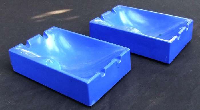 A pair of vintage Winston cigarette advertising ashtrays