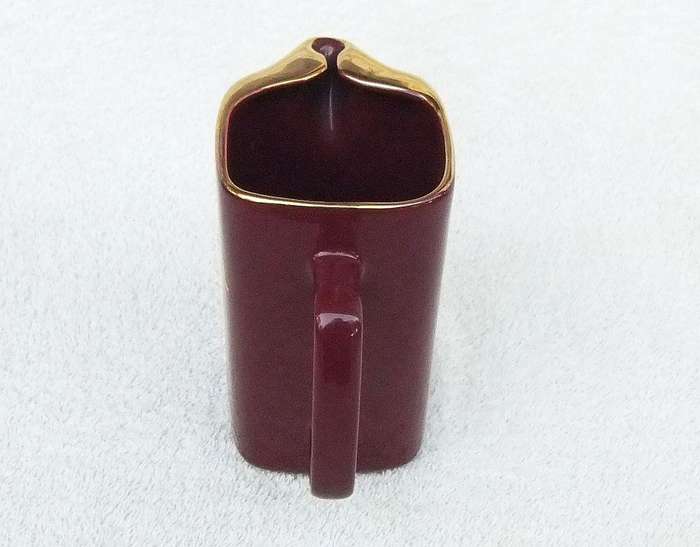 A vintage Dunhill advertising water jug by Wade England