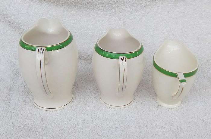 Three Art Deco period porcelain jugs by Alfred Meakin England