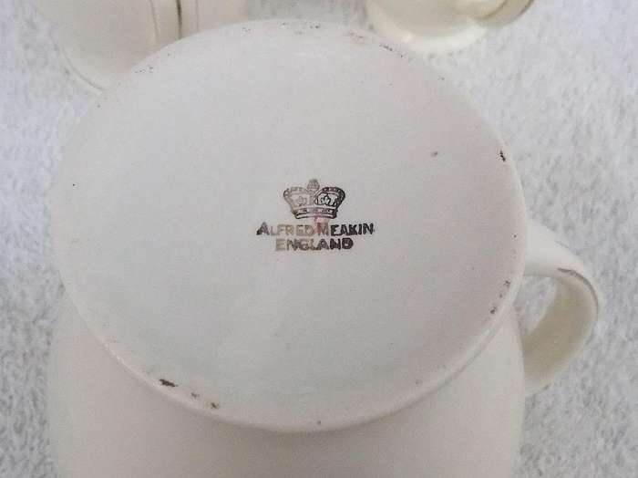 Three Art Deco period porcelain jugs by Alfred Meakin England
