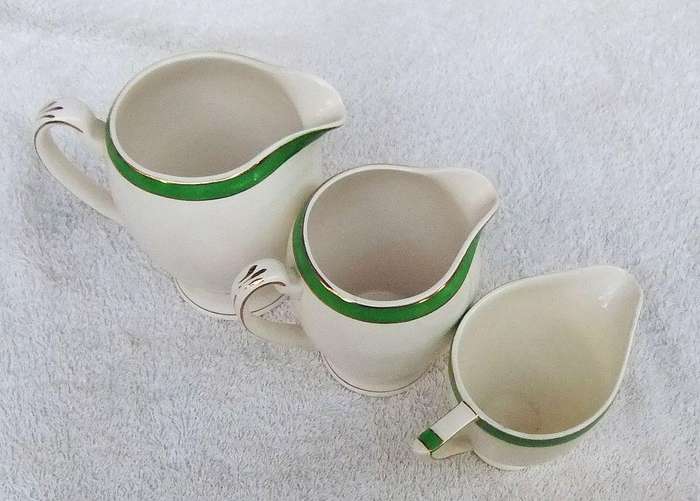 Three Art Deco period porcelain jugs by Alfred Meakin England