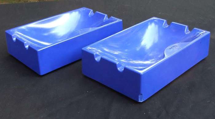 A pair of vintage Winston cigarette advertising ashtrays