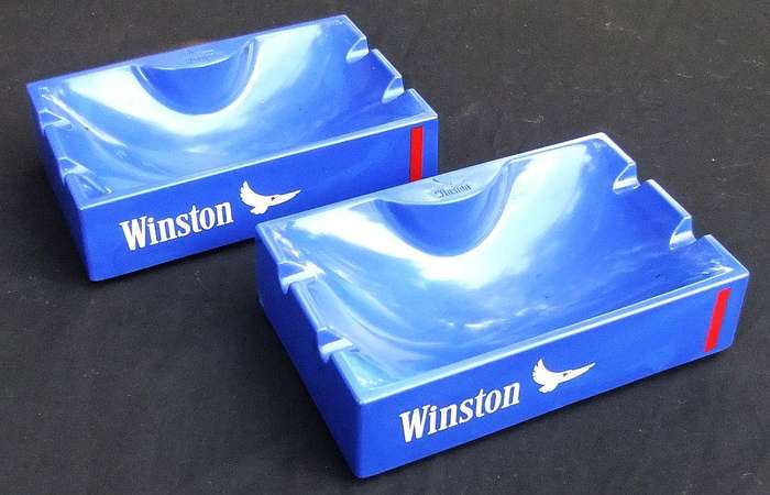 A pair of vintage Winston cigarette advertising ashtrays