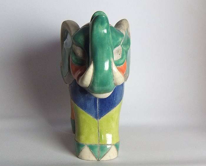 A large signed hand painted Raku pottery elephant figure in prestine condition