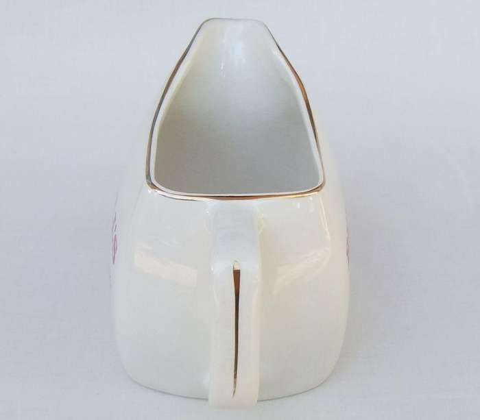 A vintage Bells whisky advertising bar water jug made by Wade England