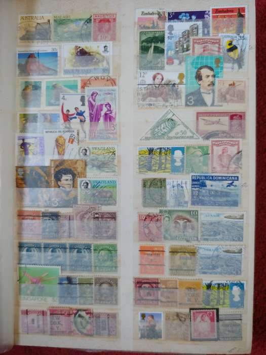 MASSIVE AMOUNT OF STAMPS IN A4 32 DOUBLE SIDED PAGES MANY FINDS POSSABLE NOT CHECKED