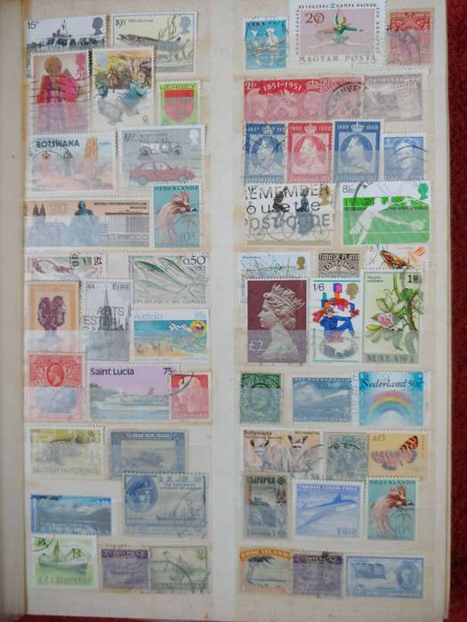 MASSIVE AMOUNT OF STAMPS IN A4 32 DOUBLE SIDED PAGES MANY FINDS POSSABLE NOT CHECKED