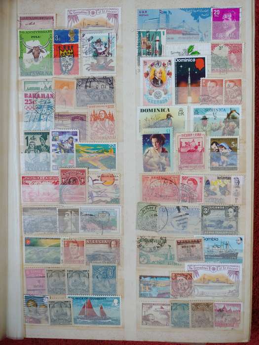 MASSIVE AMOUNT OF STAMPS IN A4 32 DOUBLE SIDED PAGES MANY FINDS POSSABLE NOT CHECKED