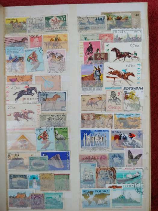 MASSIVE AMOUNT OF STAMPS IN A4 32 DOUBLE SIDED PAGES MANY FINDS POSSABLE NOT CHECKED