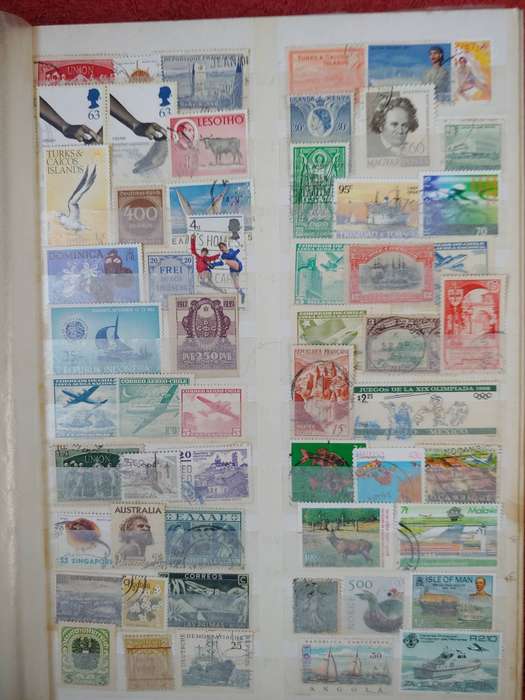 MASSIVE AMOUNT OF STAMPS IN A4 32 DOUBLE SIDED PAGES MANY FINDS POSSABLE NOT CHECKED