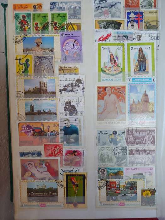 MASSIVE AMOUNT OF STAMPS IN A4 32 DOUBLE SIDED PAGES MANY FINDS POSSABLE NOT CHECKED