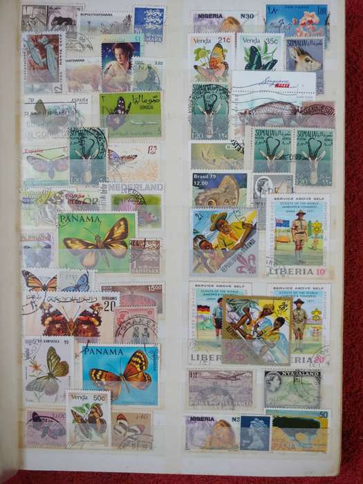 MASSIVE AMOUNT OF STAMPS IN A4 32 DOUBLE SIDED PAGES MANY FINDS POSSABLE NOT CHECKED