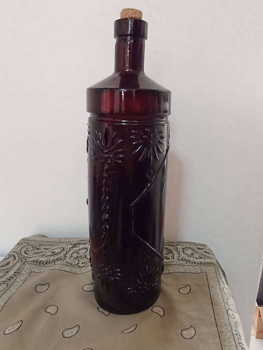 Antique glass..dark purple bottle in great condition