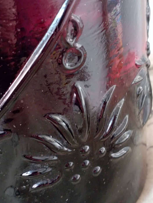 Antique glass..dark purple bottle in great condition