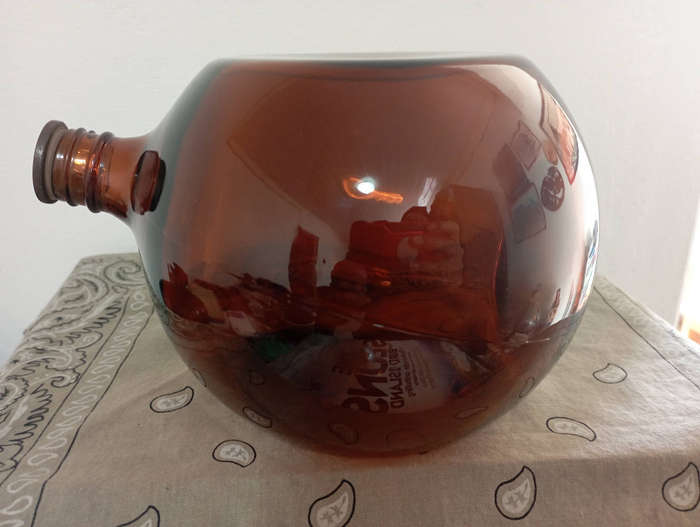 Old amber glass Saki bottle Japan