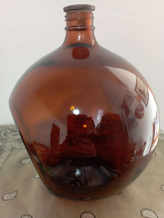 Old amber glass Saki bottle Japan