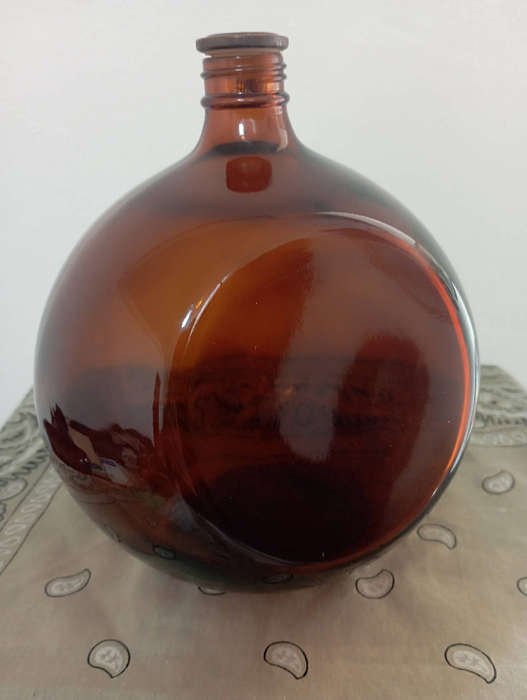 Old amber glass Saki bottle Japan