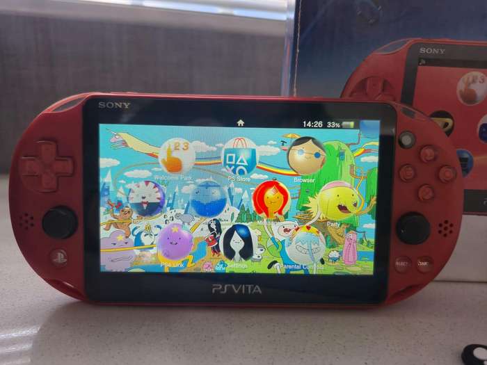 PS Vita 2000 Metallic Red, 128GB Evo SD Card, Pouch, 16GB Vita Card