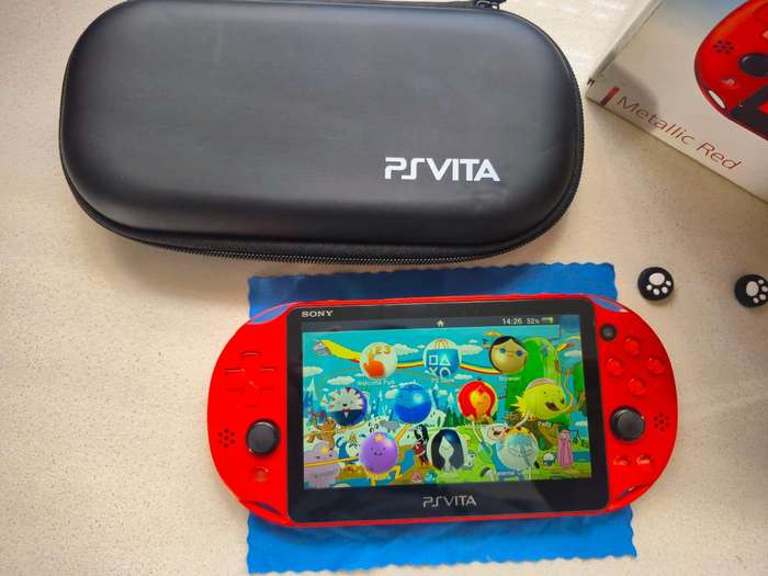 PS Vita 2000 Metallic Red, 128GB Evo SD Card, Pouch, 16GB Vita Card