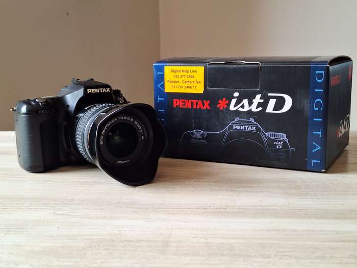 Pentax *ist D digital camera with lens