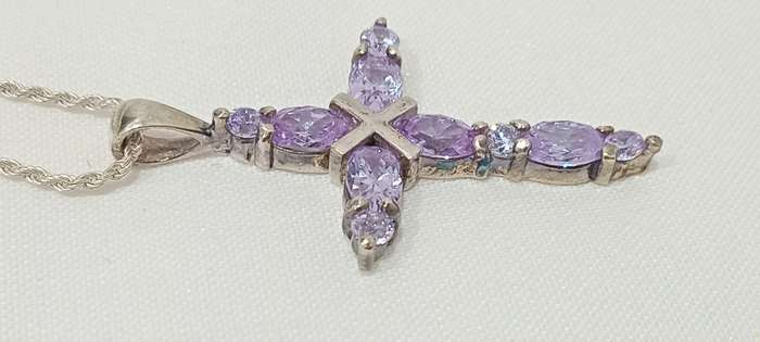 Sterling silvercross with purple cubic stones