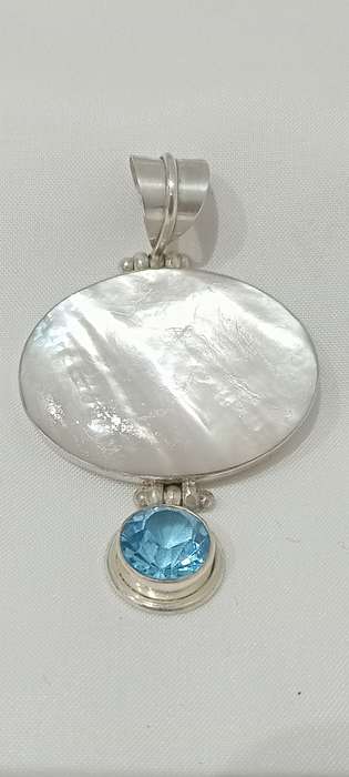 Vintage sterling silver pendant with MOP and blue stone