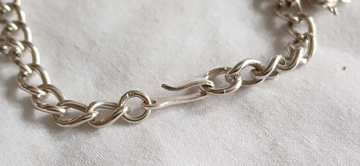 Vintage sterling silver charmed bracelet