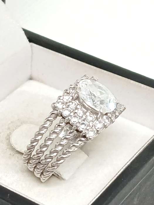 Sterling silver twist ring with cubic stones