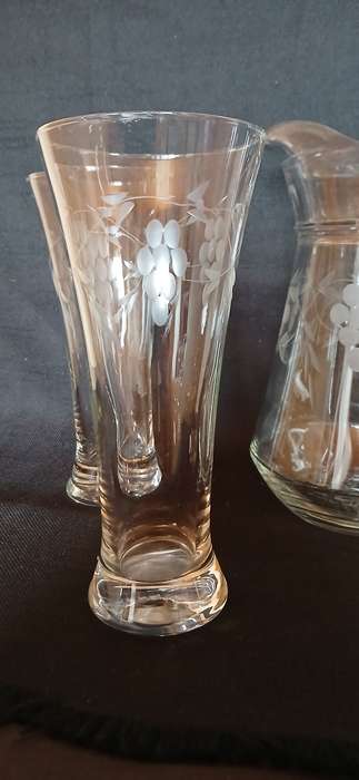 Vintage pitcher and glasses with etched grapes