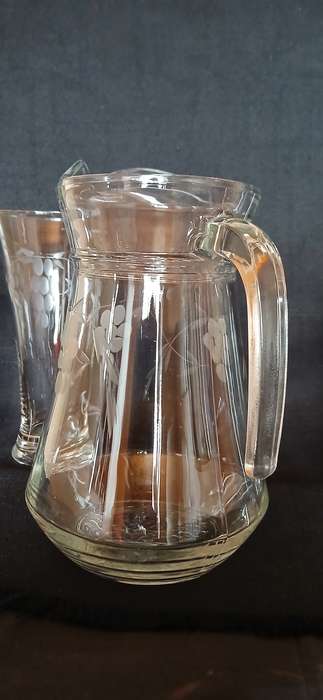 Vintage pitcher and glasses with etched grapes