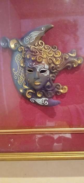 Vintage framed porcelain masks