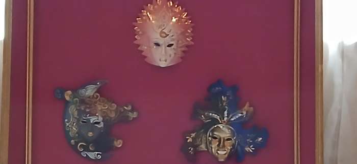 Vintage framed porcelain masks