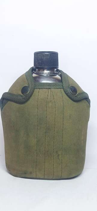Vintage U.S military metal canteen with cover