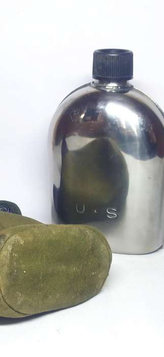 Vintage U.S military metal canteen with cover