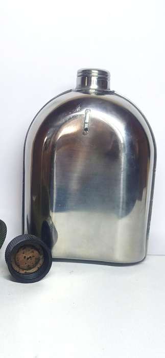 Vintage U.S military metal canteen with cover