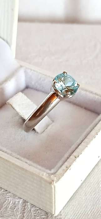 Sterling silver ring with light blue stone