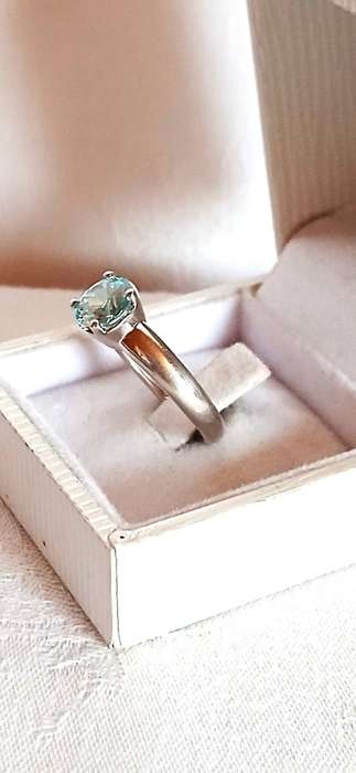 Sterling silver ring with light blue stone