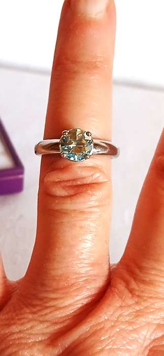 Sterling silver ring with light blue stone